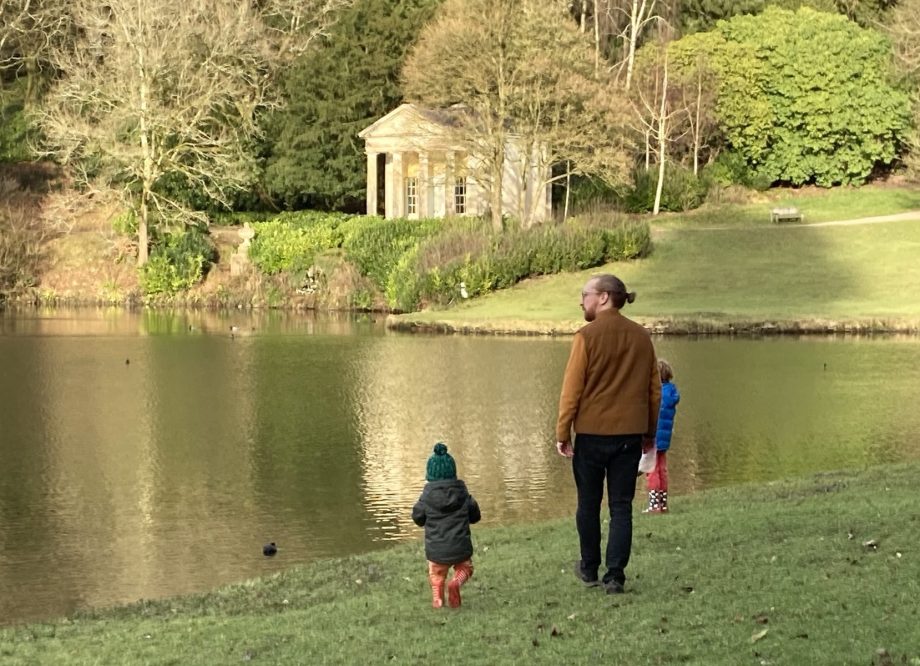 Craig Stewart, SEO expert and content consultant, walks with his two sons at Stourhead National Trust property, near Frome in Somerset, the South-West of England.